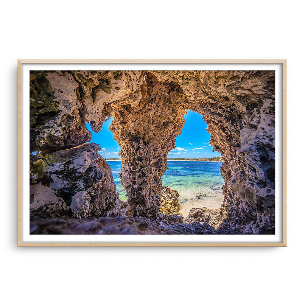 Natures windows at Sandy Cape in Western Australia framed in raw oak