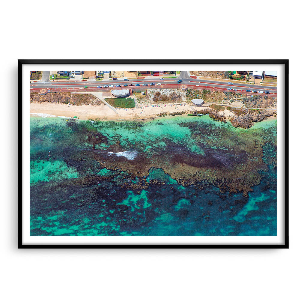 Aerial view of the reef at Mettams Pool in Perth, Western Australia framed in black