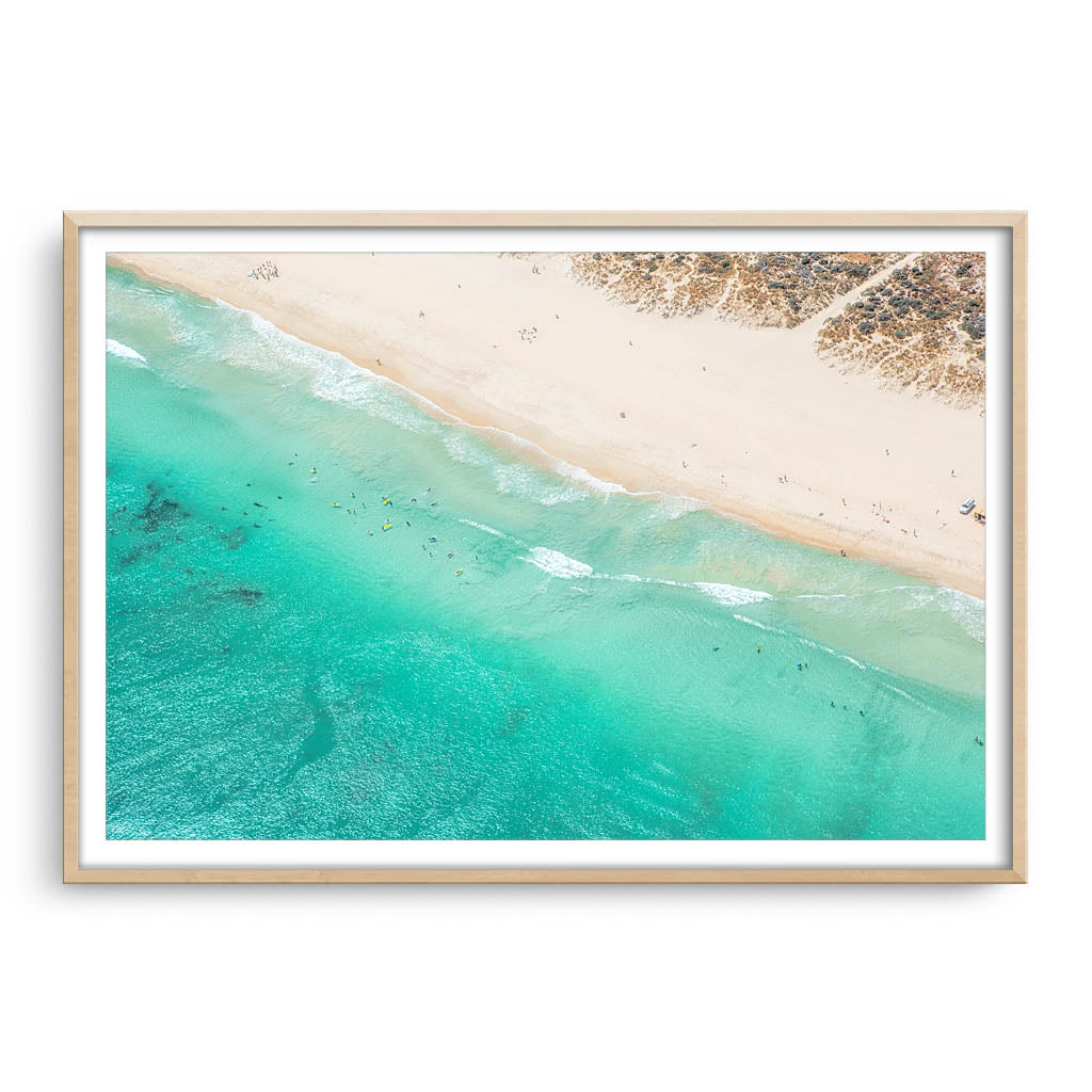 Aerial view of surf school at Trigg Beach, Perth, Western Australia framed in raw oak