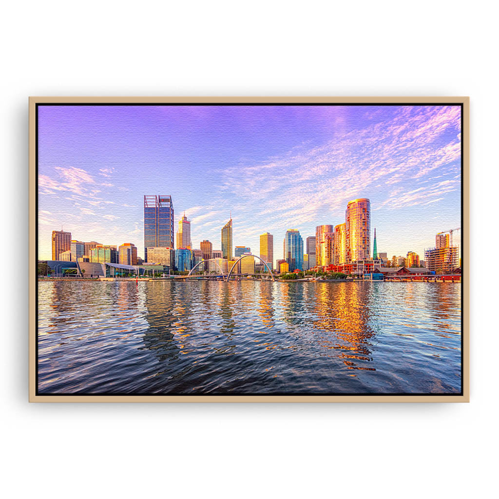 Perth city from the Swan River glowing in the afternoon sun, Western Australia framed canvas in raw oak