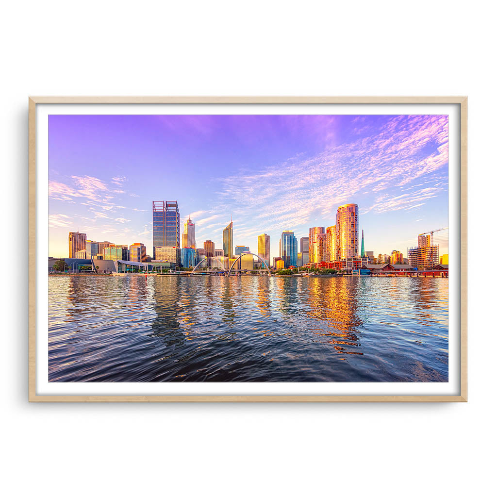 Perth city from the Swan River glowing in the afternoon sun, Western Australia framed in raw oak