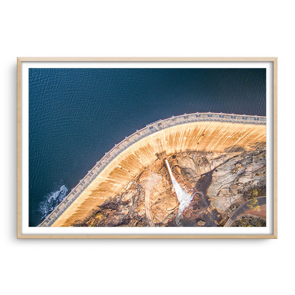 Aerial view of Collie Dam in Western Australia framed in raw oak