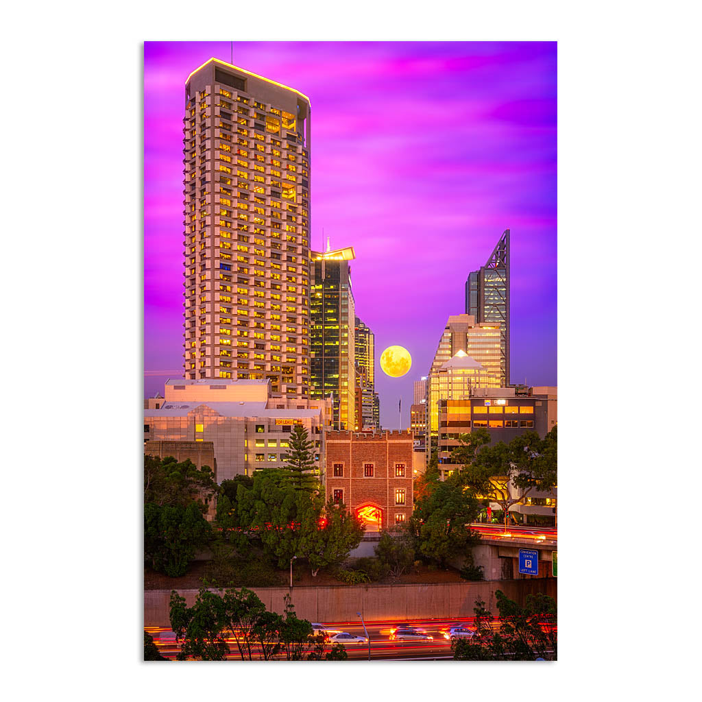 Moon rising through the city of Perth, Western Australia