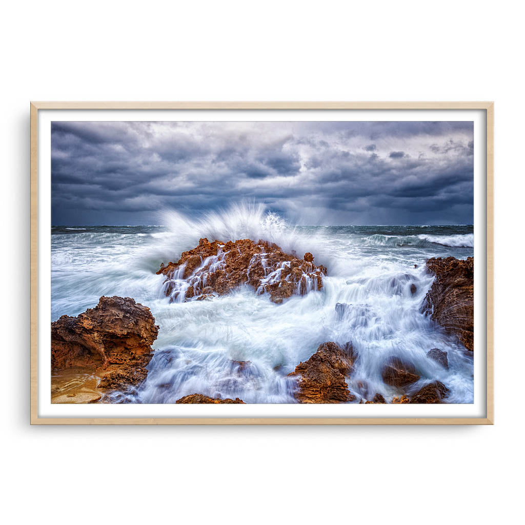 Stormy ocean in Perth, Western Australia framed in raw oak