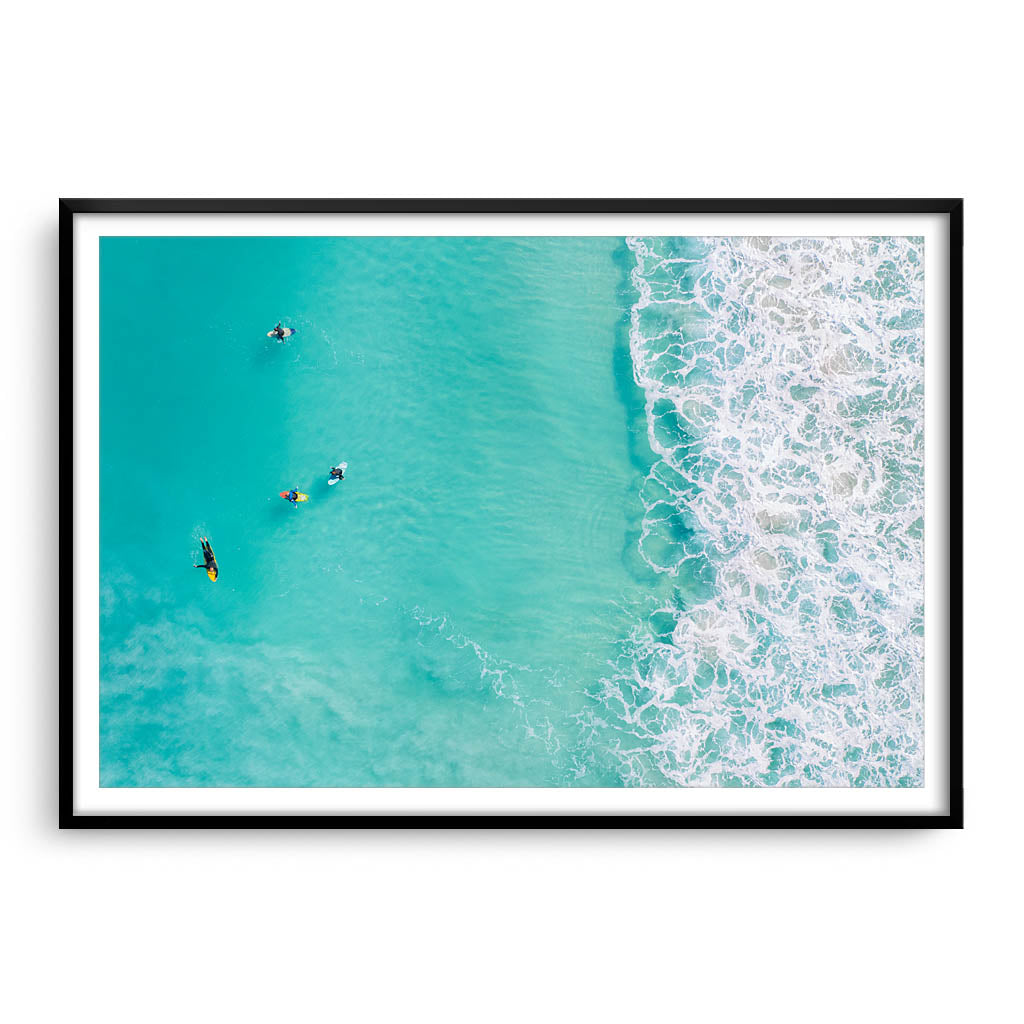 Surfers at Trigg Beach in Perth, Western Australia framed in black