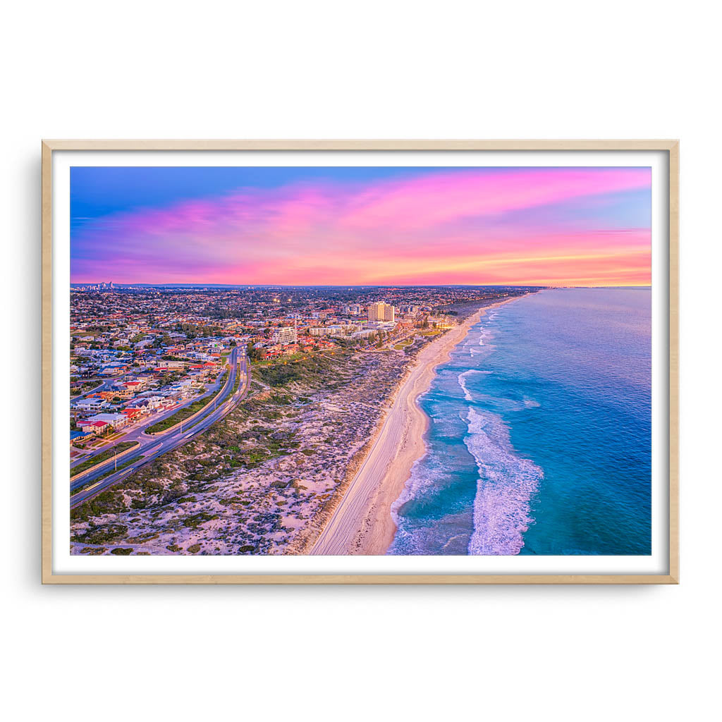 Aerial view of Scarborough Beach at sunset in Perth, Western Australia framed in raw oak