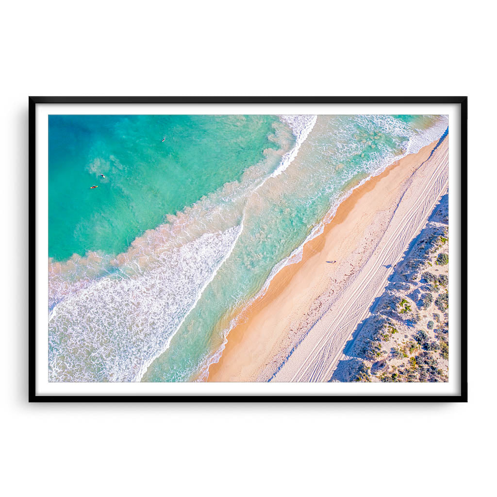 Aerial view of surf at Trigg Beach in Perth, Western Australia framed in black