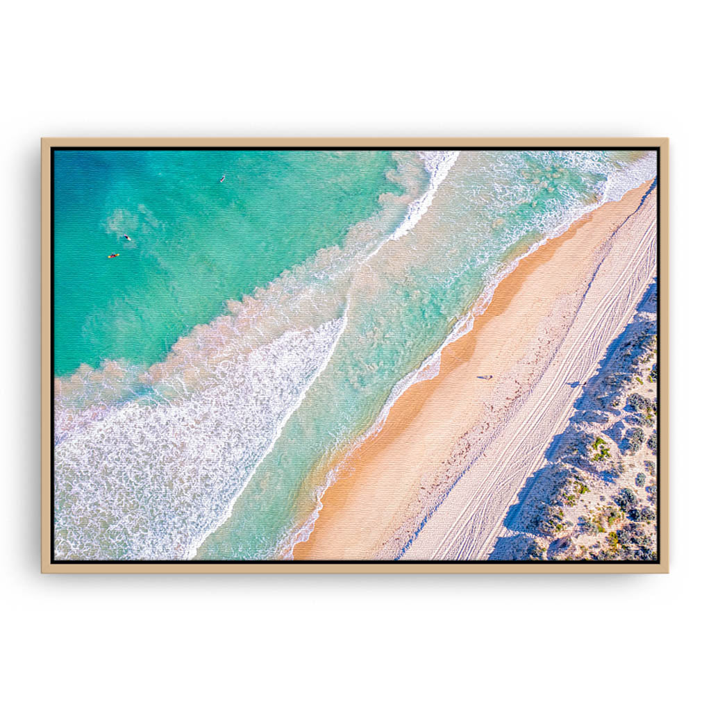 Aerial view of surf at Trigg Beach in Perth, Western Australia framed canvas in raw oak