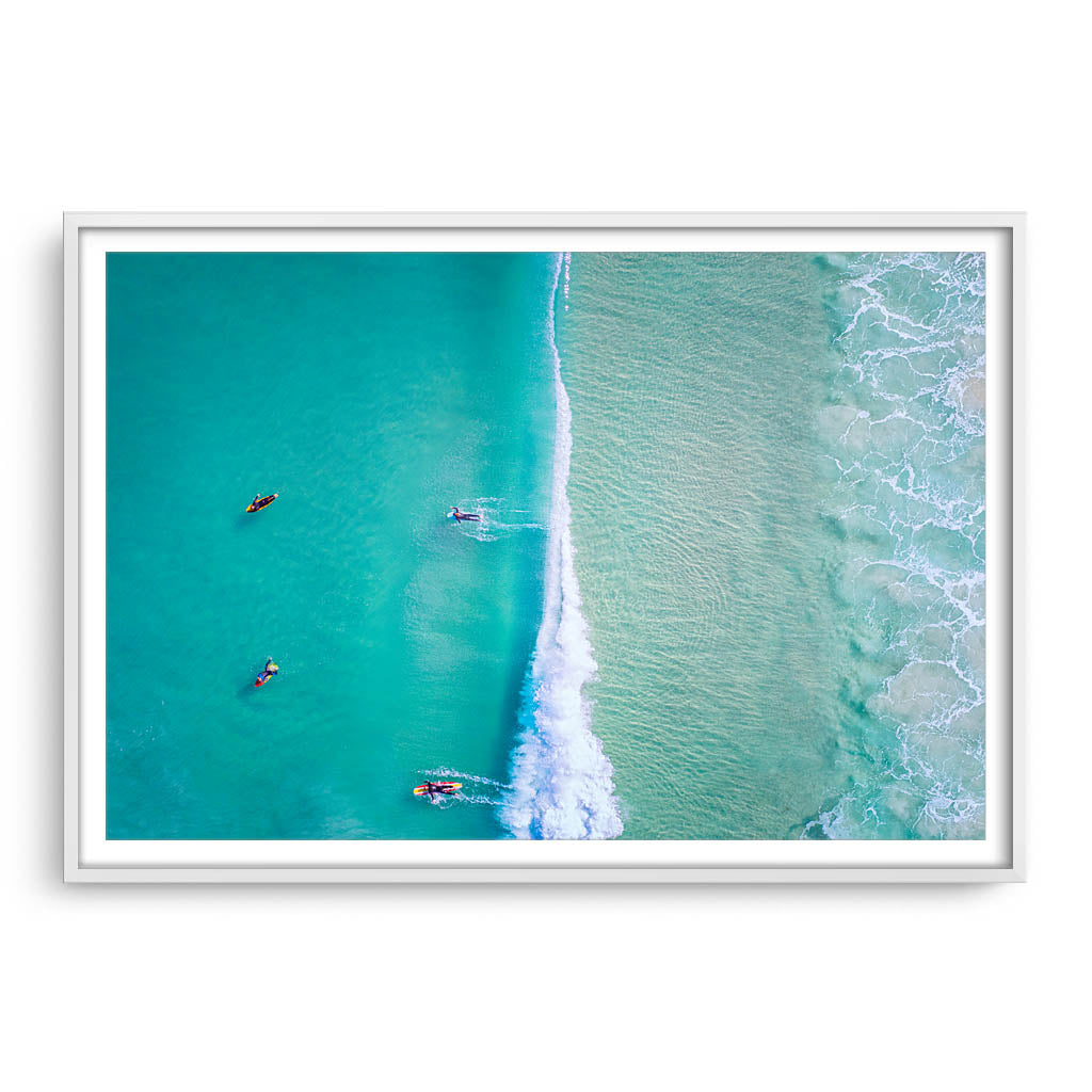 Aerial view of surfers at Trigg Beach in Perth, Western Australia framed in white