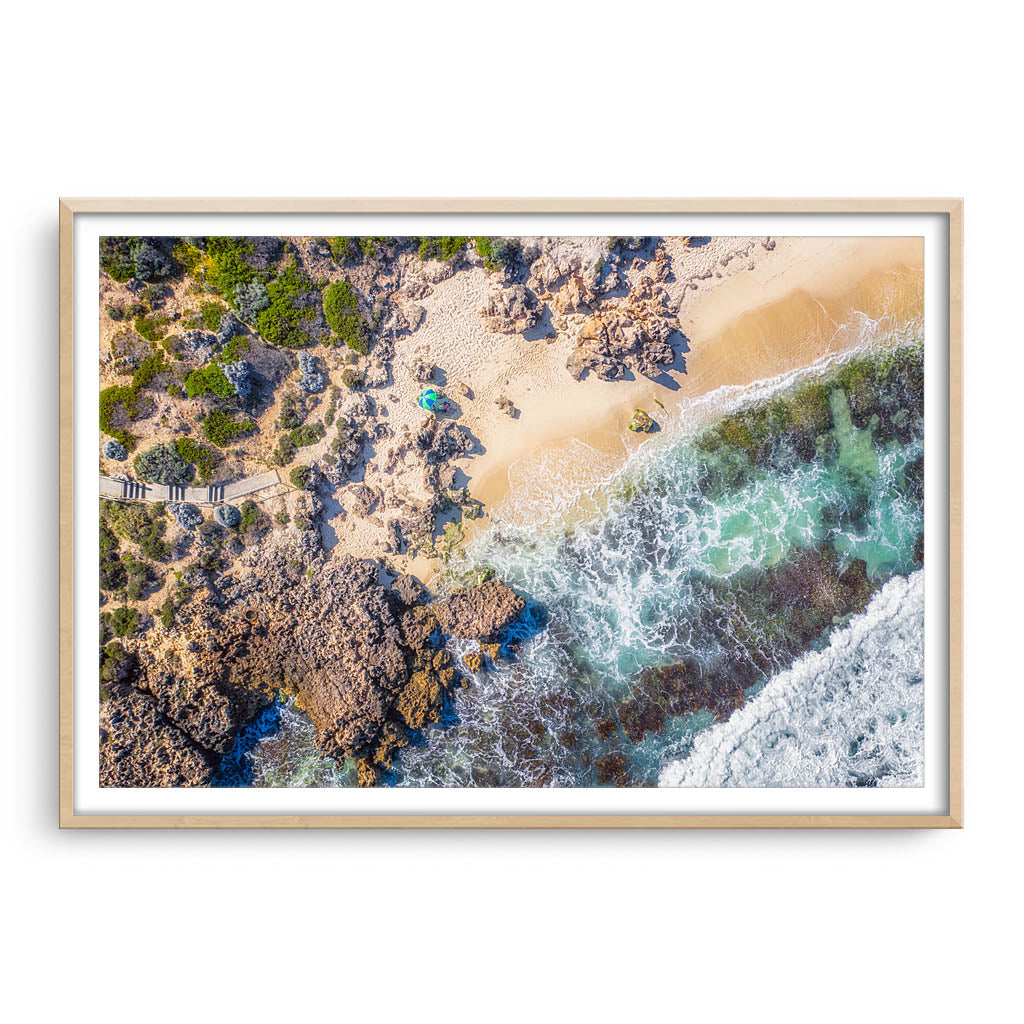 Aerial view of North Beach in Perth, Western Australia framed in raw oak