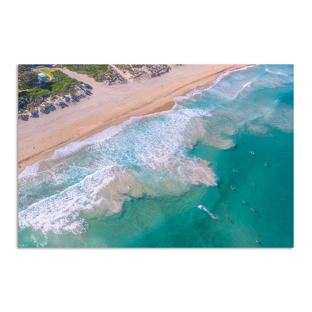 Aerial view of surfers at Trigg Beach in Perth, Western Australia