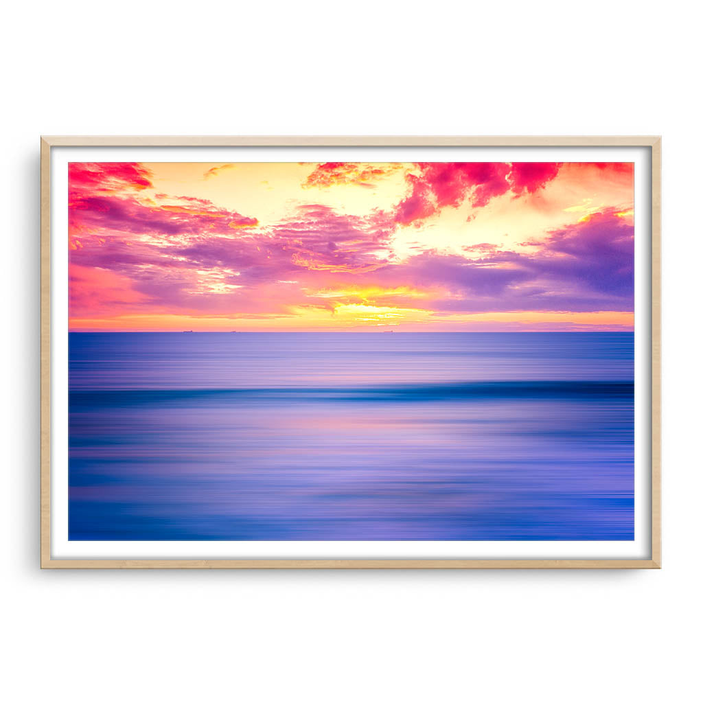 Sunset over Bennion Beach in Perth, Western Australia framed in raw oak