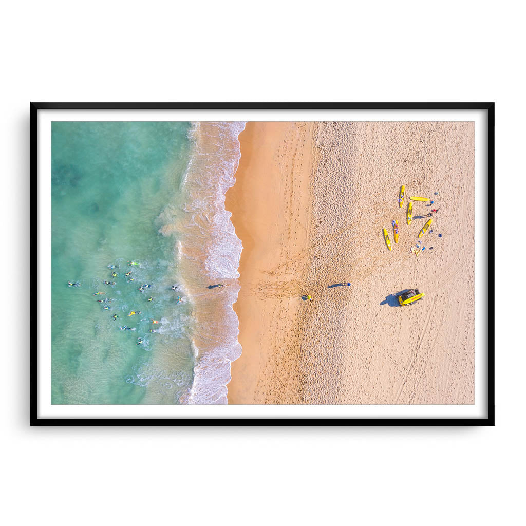 Aerial view of swimmers at Trigg Beach in Perth, Western Australia framed in black