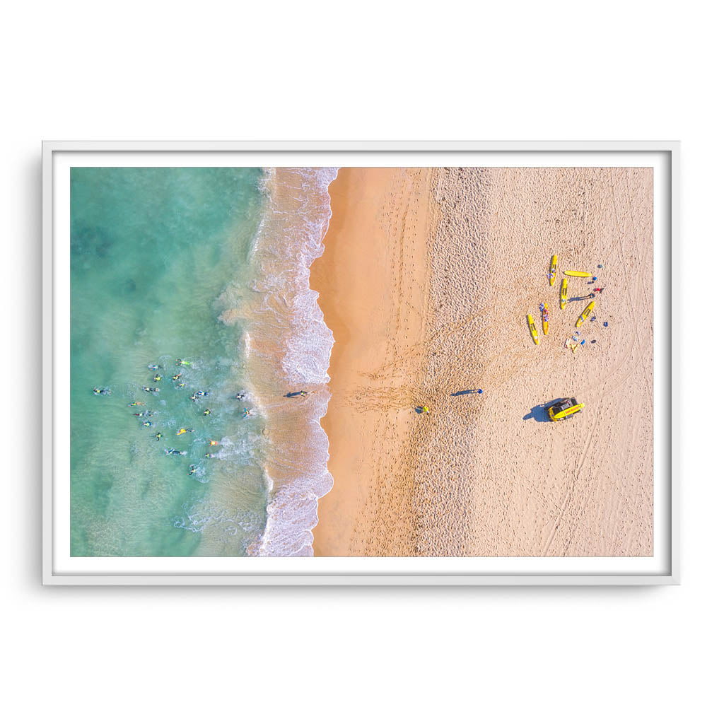 Aerial view of swimmers at Trigg Beach in Perth, Western Australia framed in white