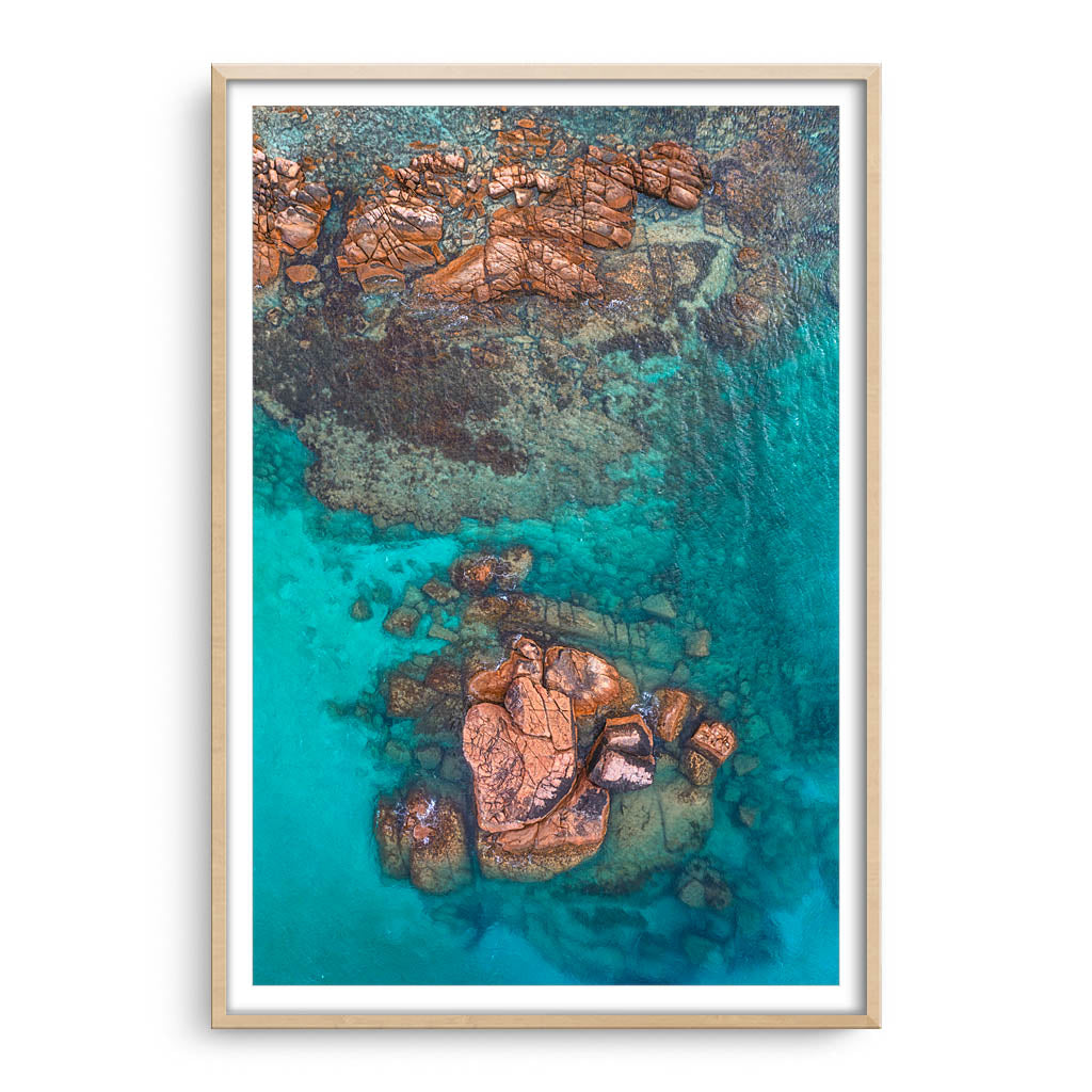 Aerial view of Gannet Rock in South Western Australia framed in raw oak
