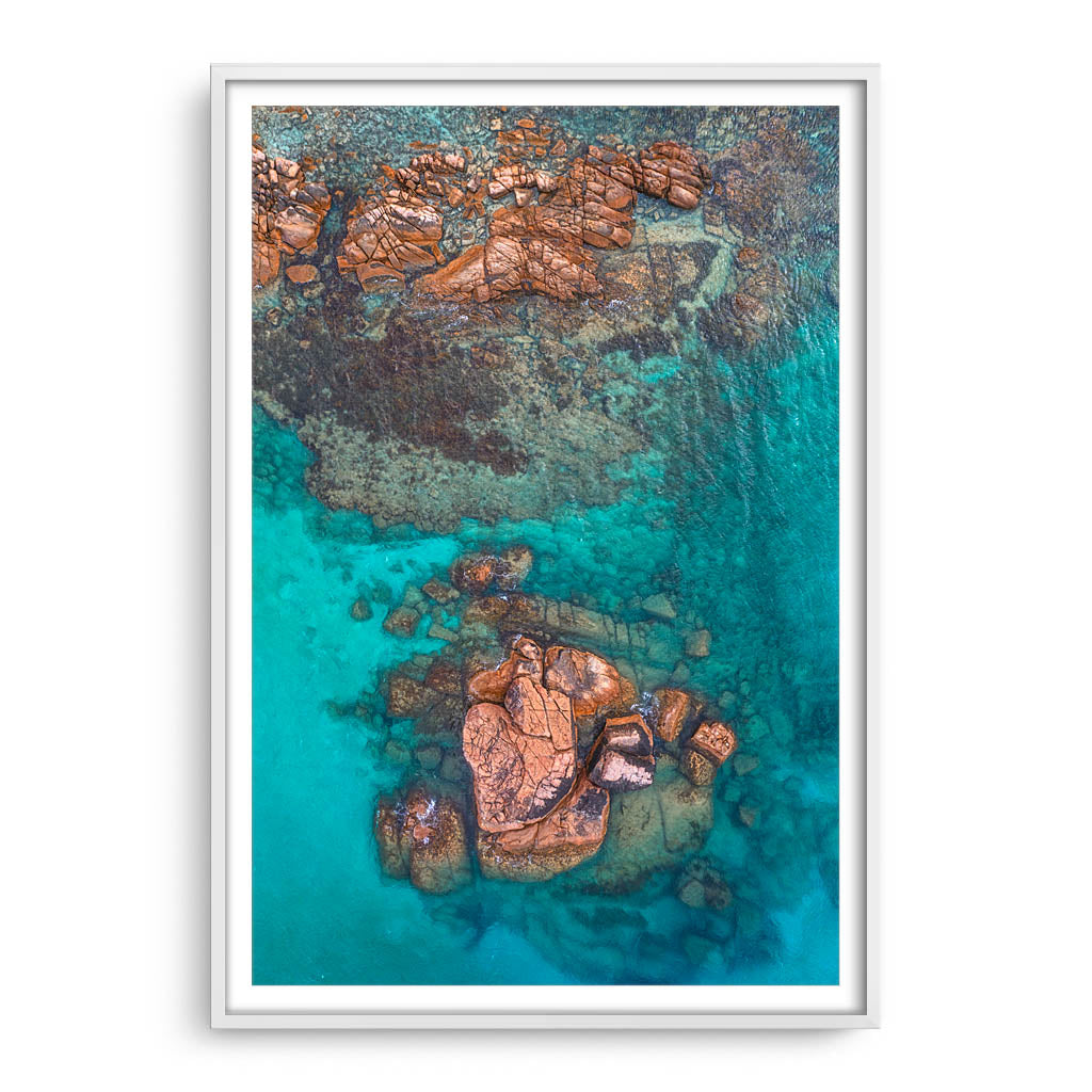 Aerial view of Gannet Rock in South Western Australia framed in white