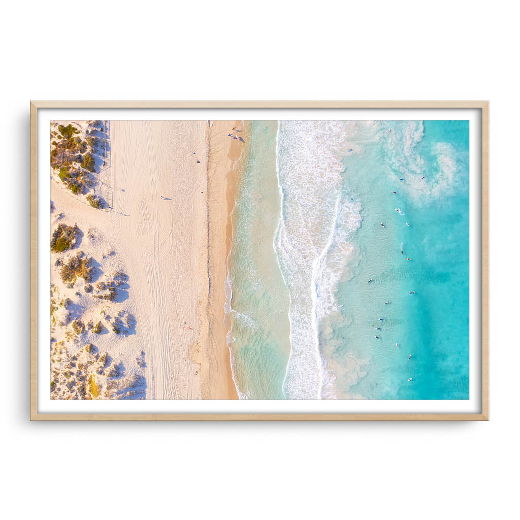 Aerial view of Scarborough Beach in Western Australia framed in raw oak