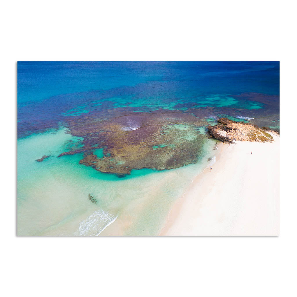 Crystal clear rock pools at Trigg Beach in Perth Western Australia